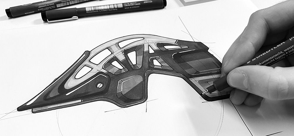 Product Designer Sketching a Bike Helmet